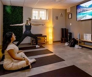 students participating in yoga and meditation in basement of Stevenson Vincent